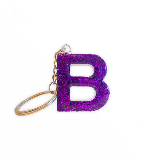 Nøkkelring med lilla glitter